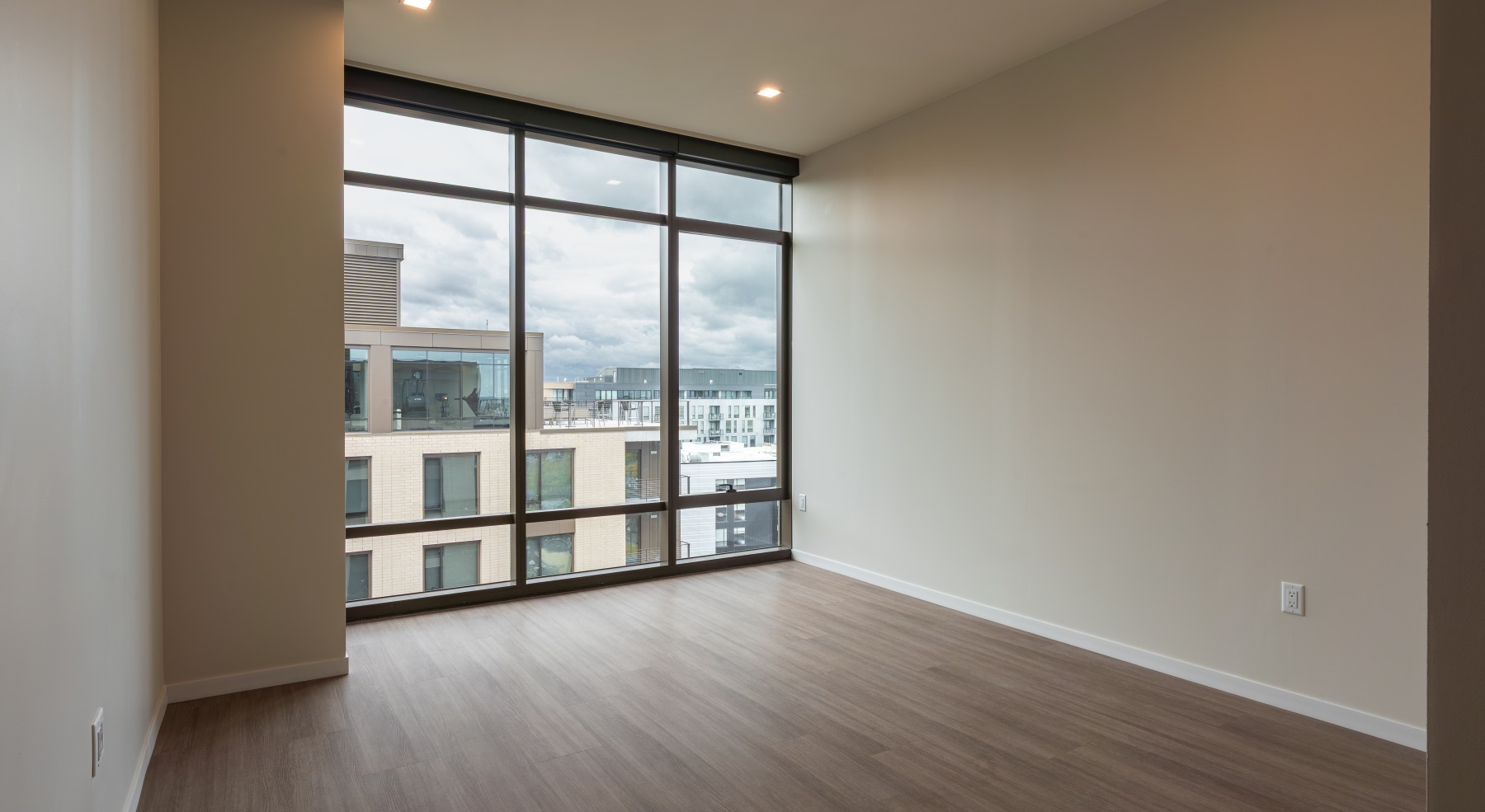 Bedroom with natural lighting and high ceilings