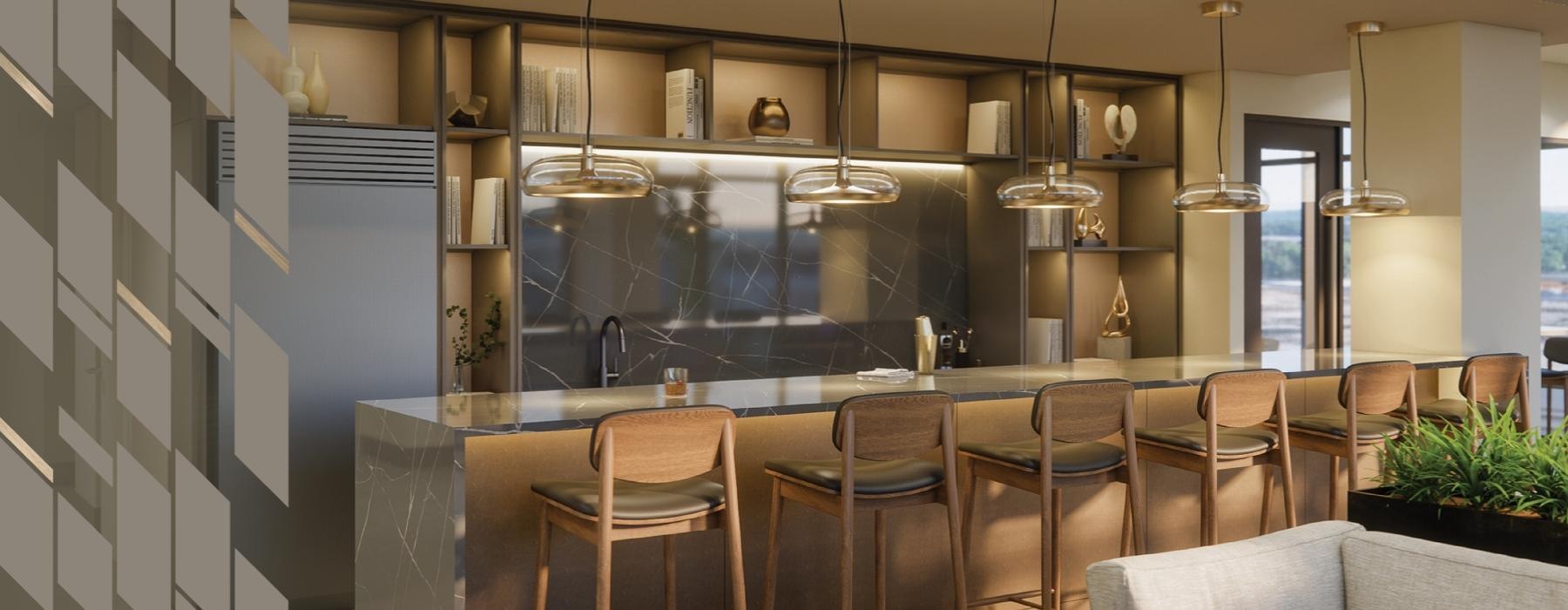 a kitchen with a bar and chairs