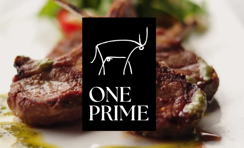 a photo of a piece of steak and a salad